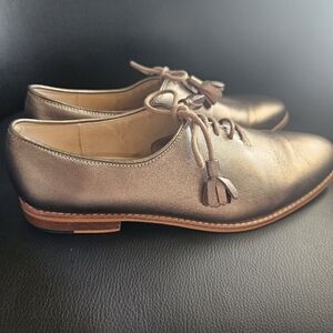 Le Casino Oxford formal leather gold and wood.